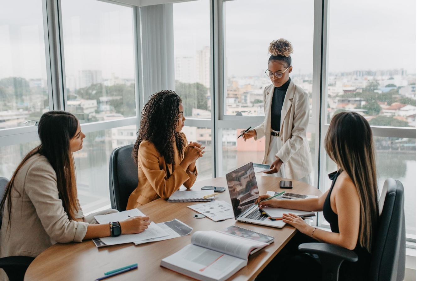 A focused intake conversation at a conference table